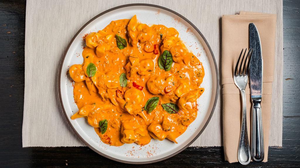 Sacchetti Al Peperoncino Dinner · Spicy. Spicy ground sausage, calabrian chillies and tequila pink cream sauce.