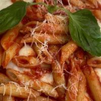 Chicken Parmigiana Dinner · Served with pasta.