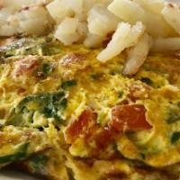Feta, Spinach & Tomato Omelette · Eggs feta cheese spinach tomatoes
