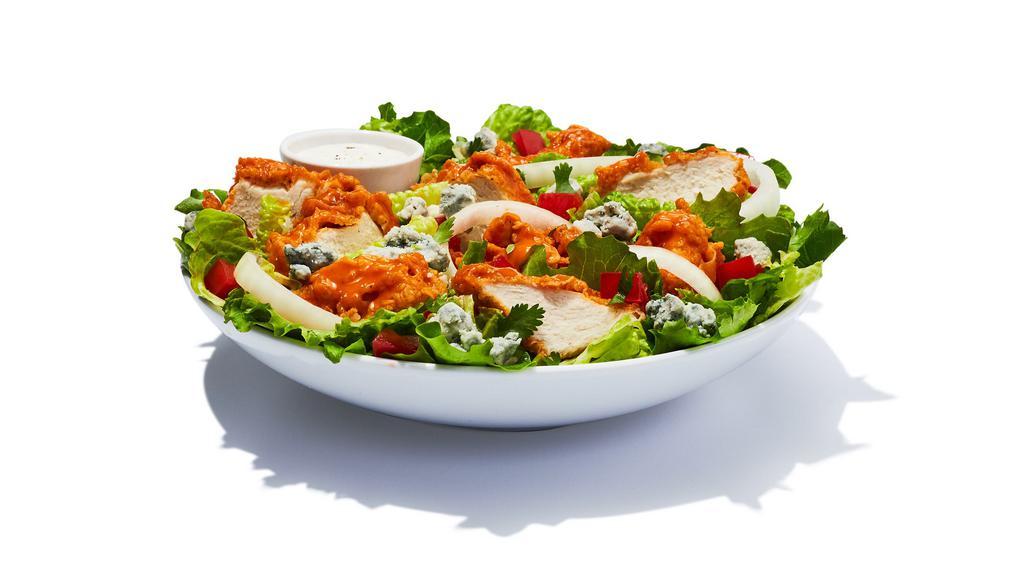 Hooters Original Buffalo Chicken Salad · Spring mix greens stacked with breaded chicken tossed in your favourite wing sauce. Topped with diced tomatoes, bleu cheese crumbles, onions and cilantro and your choice of bleu or ranch dressing.
