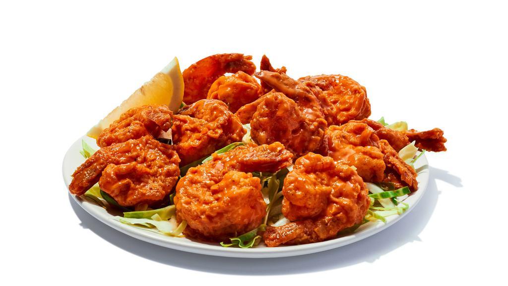 Buffalo Shrimp (12 Pieces) · Hand-breaded shrimp tossed in your favorite wing sauce. Tender inside, crispy outside. 34 cal./shrimp, sauce adds 0-380 cal.