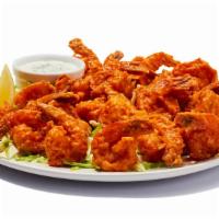 Buffalo Shrimp (24 Pieces) · Hand-breaded shrimp tossed in your favorite wing sauce. Tender inside, crispy outside. 34 ca...
