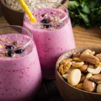Nut And Berries Smoothie · Refreshing blend of strawberry, raspberry, peanut butter, frozen yogurt, and soy milk.