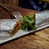 Chicken Roll · Marinated chicken tikka. Flat grilled bread wraps with lemon, option spiced onions, and mint...