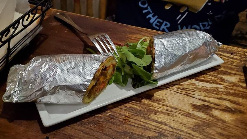 Chicken Roll · Marinated chicken tikka. Flat grilled bread wraps with lemon, option spiced onions, and mint chutney.