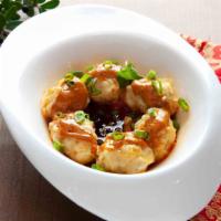 Szechuan Chili Wontons (6 Pcs.) · Hot. Six wontons stuffed with pork and shrimp served in a hot chili oil sauce.