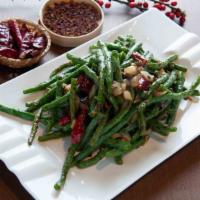 Dry-Fried String Beans · Hot, vegetarian. String beans and mushrooms stir-fried and seasoned in szechuan spices.