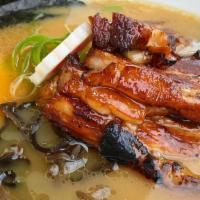 Tonkotsu Ramen · Thin noodles in the pork broth pork chashu, scallions, kikurage mushrooms, bamboo shoots, eg...