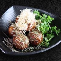 Akashi Takoyaki (6Pcs) · Fried octopus ball with sweet-savory sauce, mayo, and bonito, and nori flakes.