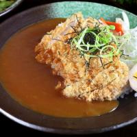 Pork Katsu Curry Don · Japanese juicy fried pork katsu, served over rice with seasoned egg, cabbage , scallions, fu...