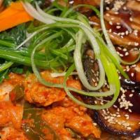 Kimchi Pork Chashu Don · Braised pork belly, served oved rice with seasoned egg,homemade kimchi, seaweed salad, spina...