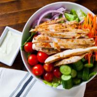 Grilled Chicken Salad Bowl · Served with grilled chicken, lettuce, tomatoes, cucumbers, carrots & raw onions. Choice of d...
