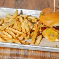 Sweet Annie'S Burger · Bacon, Monterey Jack, Onion ring, smothered in a house-made Guinness BBQ Sauce.