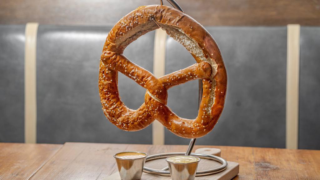 Giant Pretzel · Served hot with warm beer cheese and mustard.