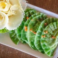 Vegetable Dumpling · Cabbage, celery, carrot, clear noodle and dried fungus with semi-sweet chili soy sauce.