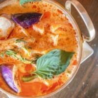 Red Curry · Spicy. Bamboo shoot, eggplant, bell pepper, basil and coconut milk in curry sauce.