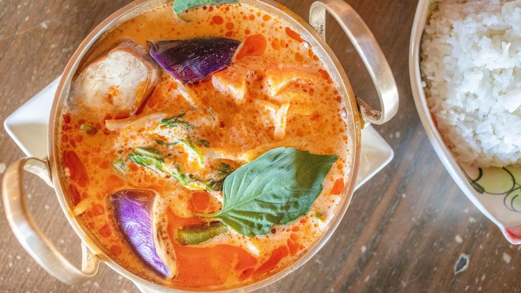 Red Curry · Spicy. Bamboo shoot, eggplant, bell pepper, basil and coconut milk in curry sauce.