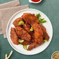 Hot Buffed Buffalo Wings · Fresh chicken wings breaded, fried until golden brown, and tossed in hot buffalo sauce. Serv...