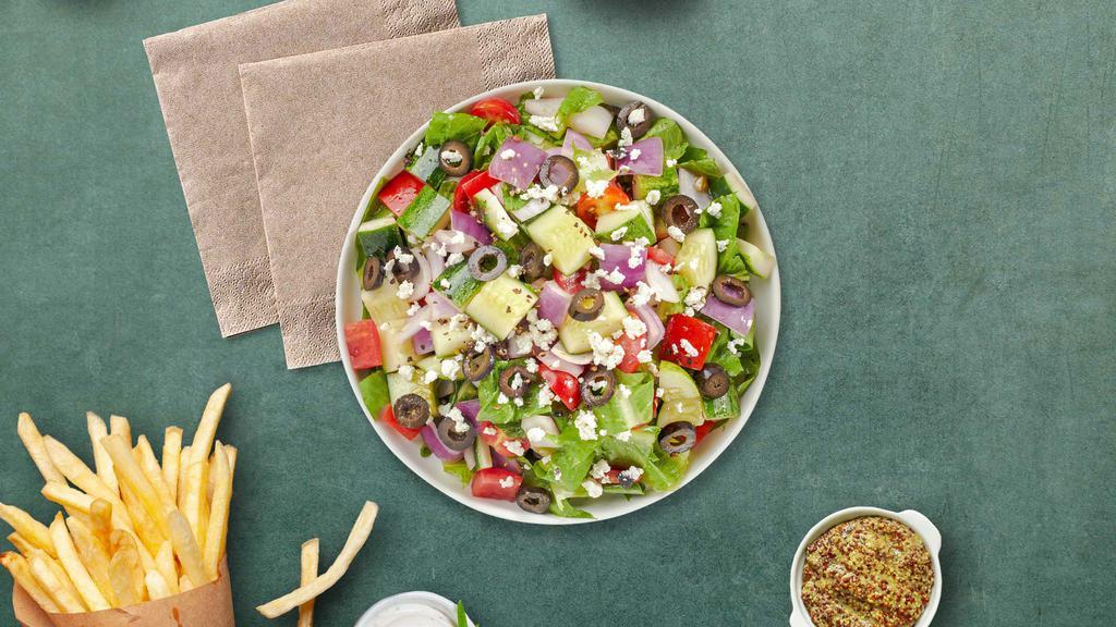 Seek A Greek Salad  · (Vegetarian) Romaine lettuce, cucumbers, tomatoes, red onions, olives, and feta cheese tossed with balsamic vinaigrette dressing.