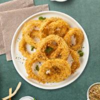 Onion Ring Bling · (Vegetarian) Sliced onions dipped in a light batter and fried until crispy and golden brown.