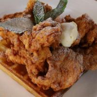 Chicken And Waffle · Citrus-chile brined chicken, southern waffle, kumquat-honey butter, bourbon maple syrup, mint