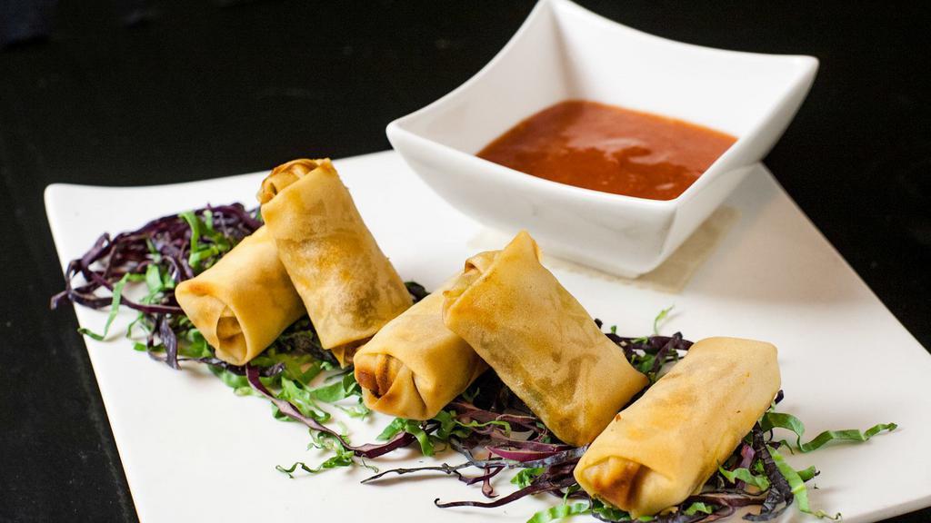 Duck Confit Spring Rolls · Sweet and spicy plum sauce.