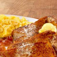 French Toast Platter · Moist french toast made with Jamaican bread.  Served with eggs and choice of meat