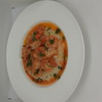 Shrimp And Grits · Creamy homestyle grits prepared with sautéed shrimp in a deliciously seasoned gravy.