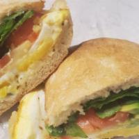 Hot Caprese Sandwich · Vegetarian. On ciabatta with fresh mozzarella, tomatoes, arugula, and basil pesto.