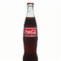 Bottled Soda · Coke / Pepsi / Sprite / Ginger Ale