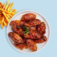 Kpop Wings · Fresh chicken wings breaded, fried until golden brown, and tossed in soy sauce, brown sugar,...