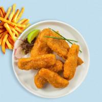 Brawny Buffalo Tenders · Chicken tenders breaded and fried until golden brown before being tossed in buffalo sauce.