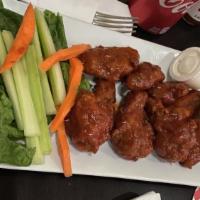 Buffalo Wings · Served with blue cheese.