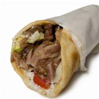 Lamb Gyro Sandwich · Homemade juicy lamb and gyro meat with, lettuce, tomatoes, our delicious white sauce topped ...