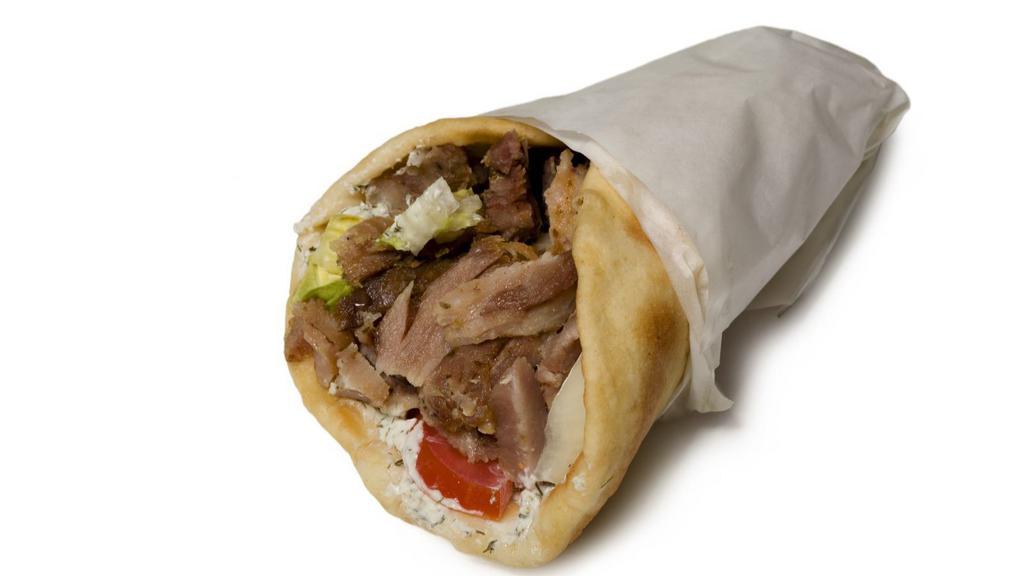 Lamb Gyro Sandwich · Mouthwatering lamb gyro tossed with diced tomatoes, thinly sliced onions and shredded lettuce in a homemade, warm pita.