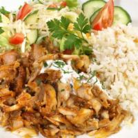 Gyro Over Rice · Homemade juicy gyro meat over rice with, lettuce, tomatoes, our delicious white sauce topped...
