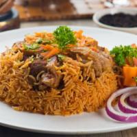 Lamb Over Rice · Homemade juicy lamb over rice with, lettuce, tomatoes, our delicious white sauce topped with...