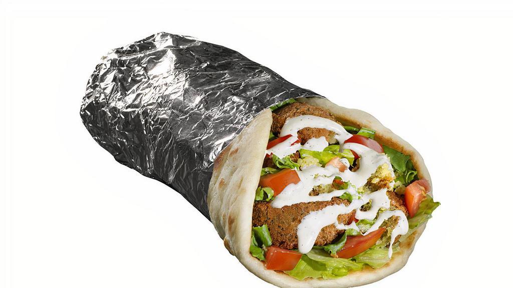 Falafel Sandwich · Served with pita, lettuce, tomatoes and choice of toppings. Served with one white sauce and one red sauce. Allergen: Contains Soy, Gluten, Pea, Mustard, and Sesame