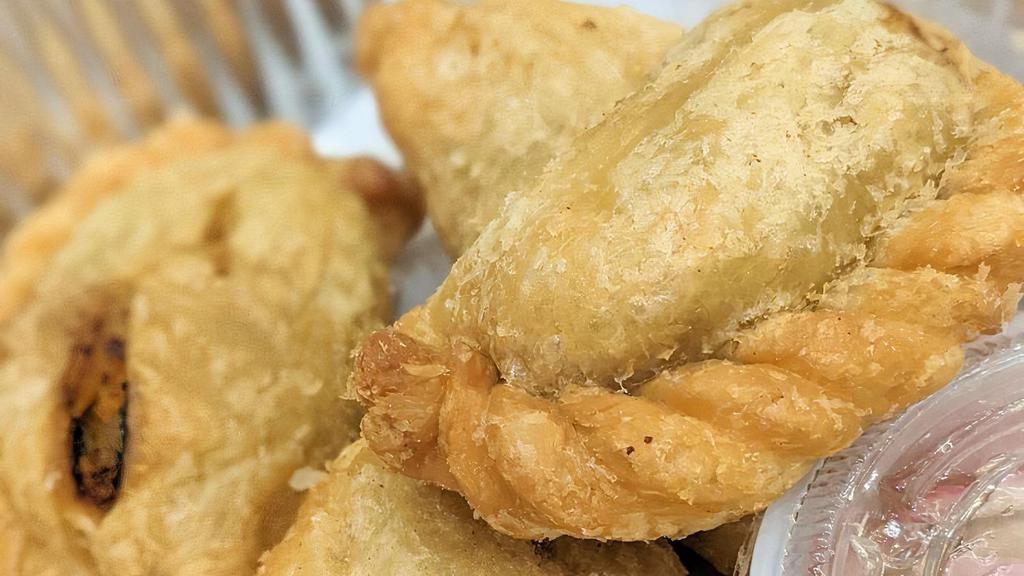 Curry Puff · Potato, onion and curry powder.