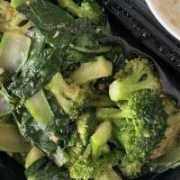 Double Broccoli · American broccoli and chinese broccoli fresh garlic light brown sauce.