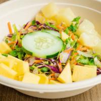 Pineapple Mango Salad · Mixed greens, pineapple chunks, mango chunks, cucumber, served with a creamy mango dressing.