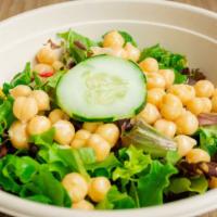 Chickpeas Salad · Arugula, chickpeas, tomatoes, cucumber, served with a sorrel balsamic dressing.