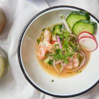 Ceviche De Camaron · Shrimp ceviche with red onion, cherry tomatoes, cilantro, serrano chile, and fresh lime citr...