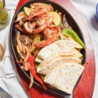 Fajitas · Mixed bell peppers, onions, zucchini, served with pico de gallo, rice and beans.
