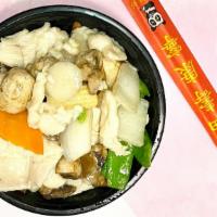 Moo Goo Gai Pan · Served with roast pork fried rice or white rice.