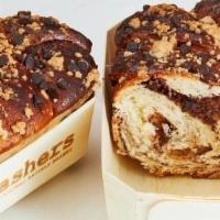 Dark Chocolate & Nutella Braided Babka · Our sweet & buttery braided babka loaf is filled with Nutella and dark chocolate chips, topp...