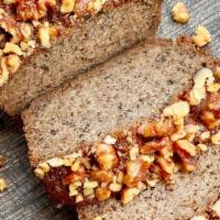Banana Walnut Loaf · Our favorite moist and tender banana bread recipe topped with walnuts!