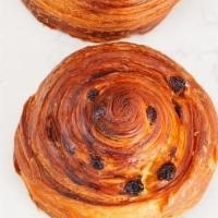 Pain Au Raisin · This laminated breakfast bun is made with imported French butter and filled with raisins and...