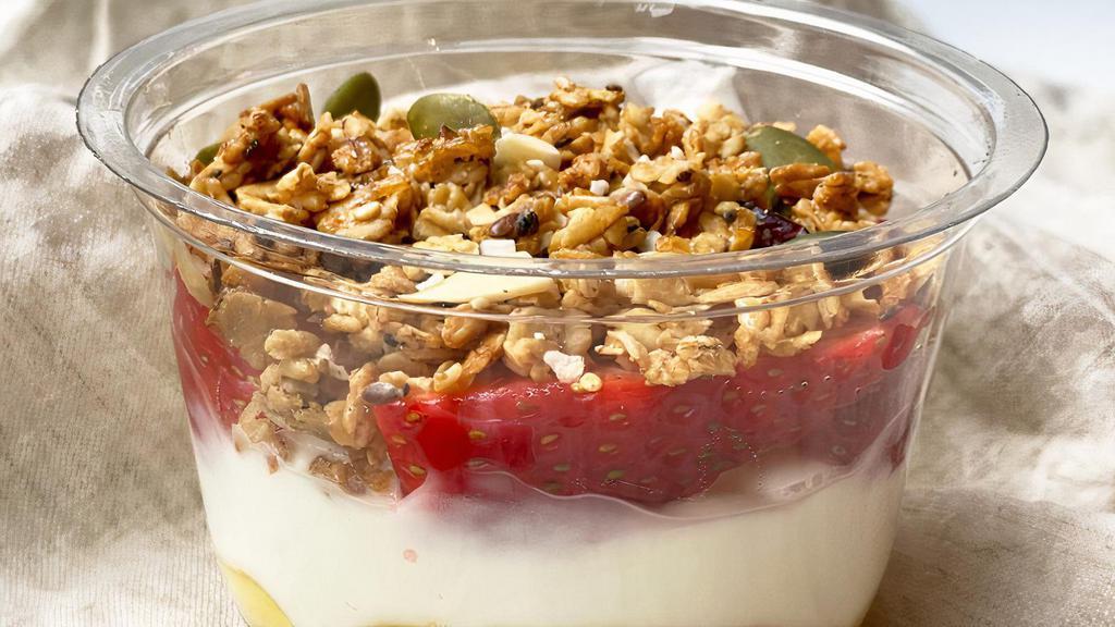 Honey & Strawberries Yogurt Parfait · Greek yogurt with Orwasher granola, honey, and fresh strawberries.