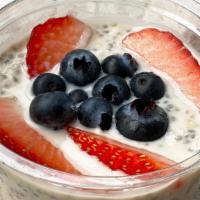 Overnight Oats · Overnight Oatmeal, chia seeds, strawberries, blueberries.
